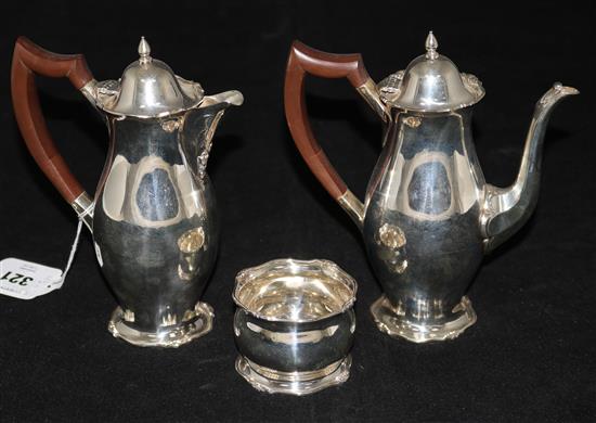 A 1930s silver cafe au lait pair and matching sugar bowl, gross 18 oz.